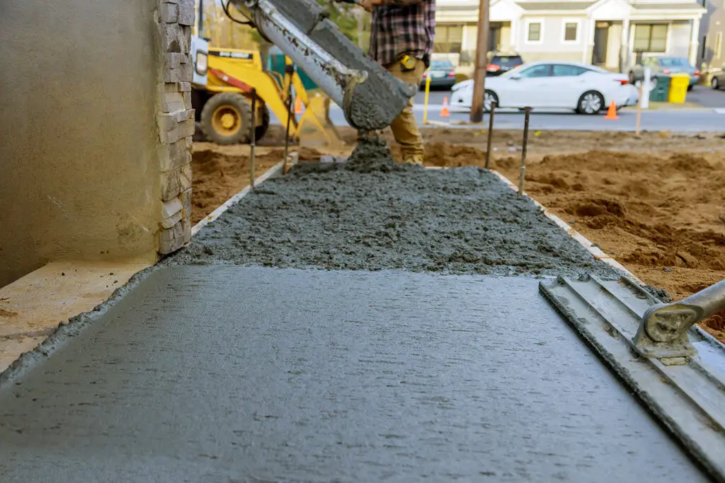 Xtreme Concrete - Contractors Pouring a New Cement Walkway